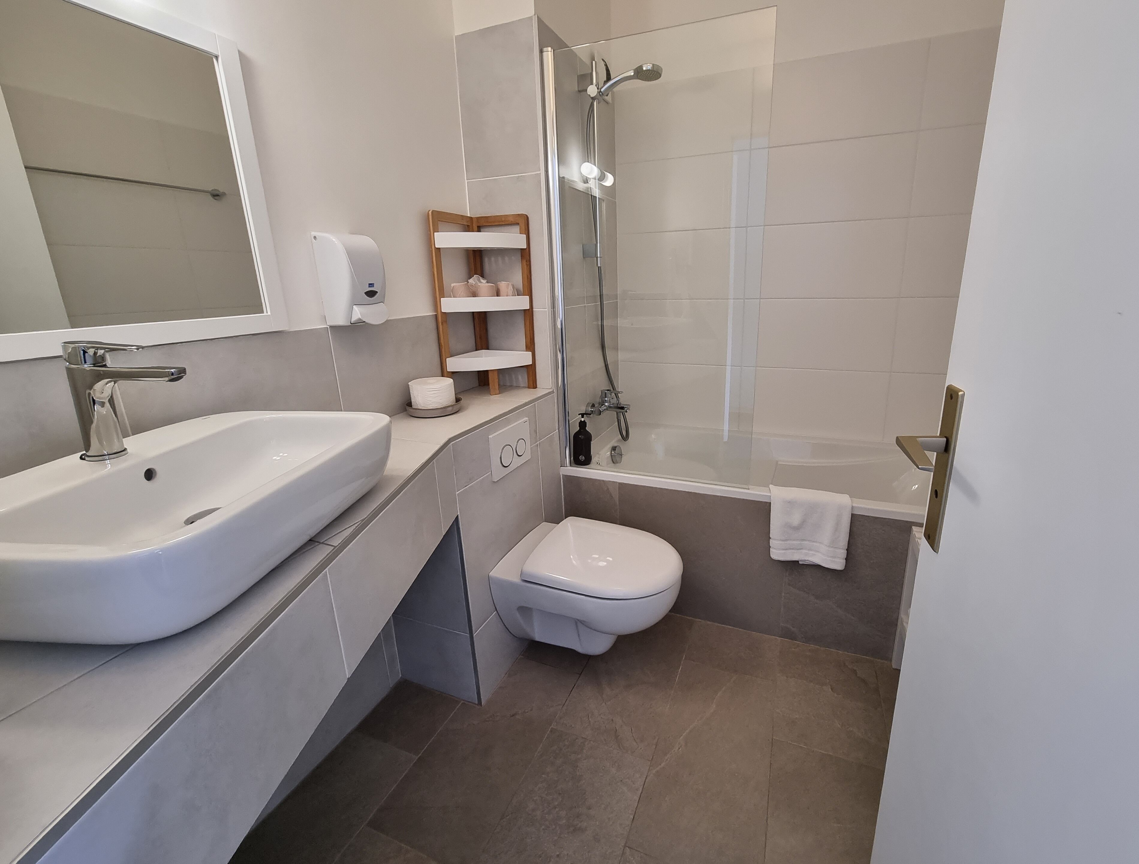 family room | bathroom | eco-friendly toiletries, hair dryer, towels, soap