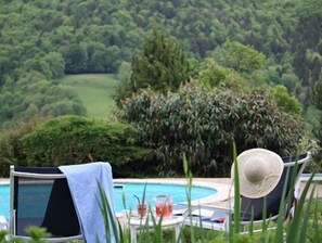 Outdoor pool, open 8:00 AM to 10:00 PM, sun loungers