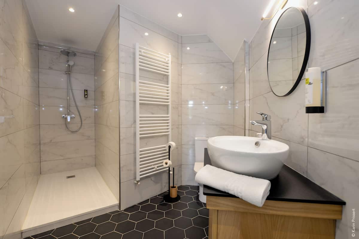 signature double room | bathroom | hair dryer, towels