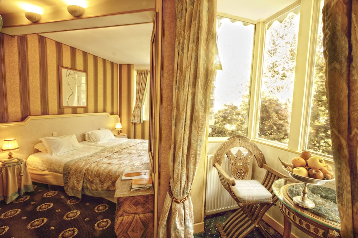 premium bedding, minibar, in-room safe, individually decorated