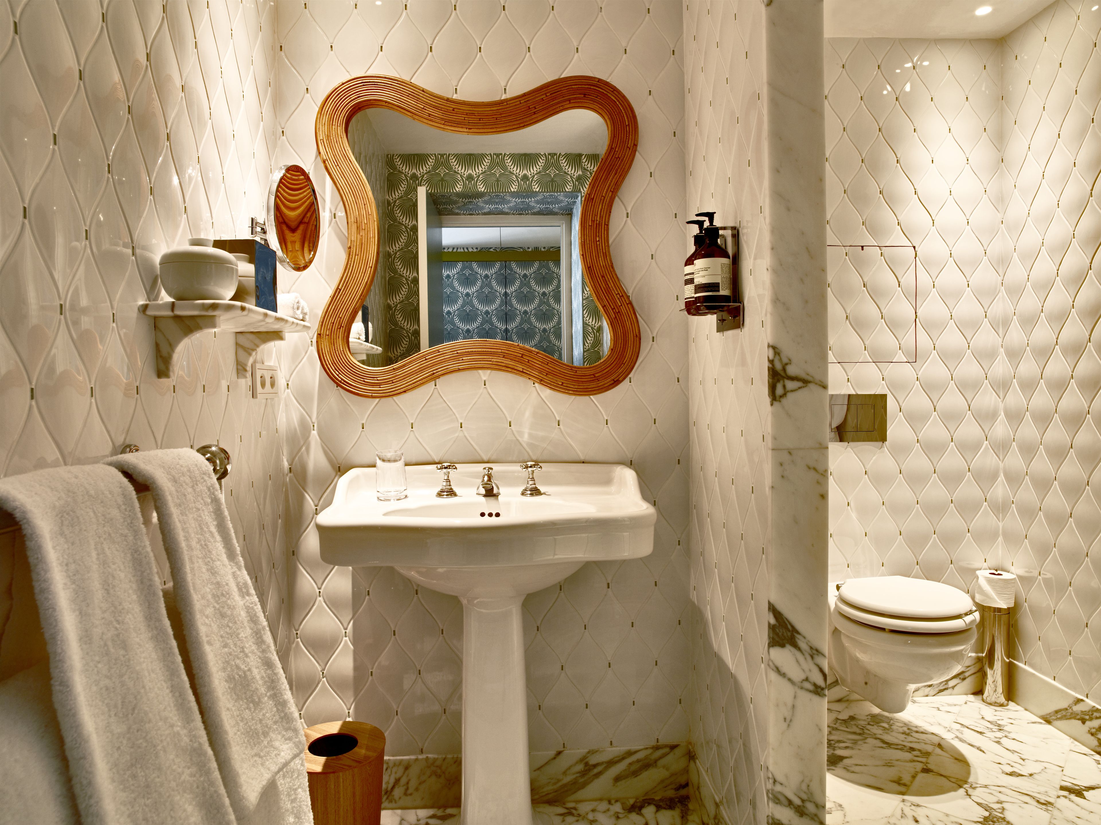 designer toiletries, hair dryer, bathrobes, slippers