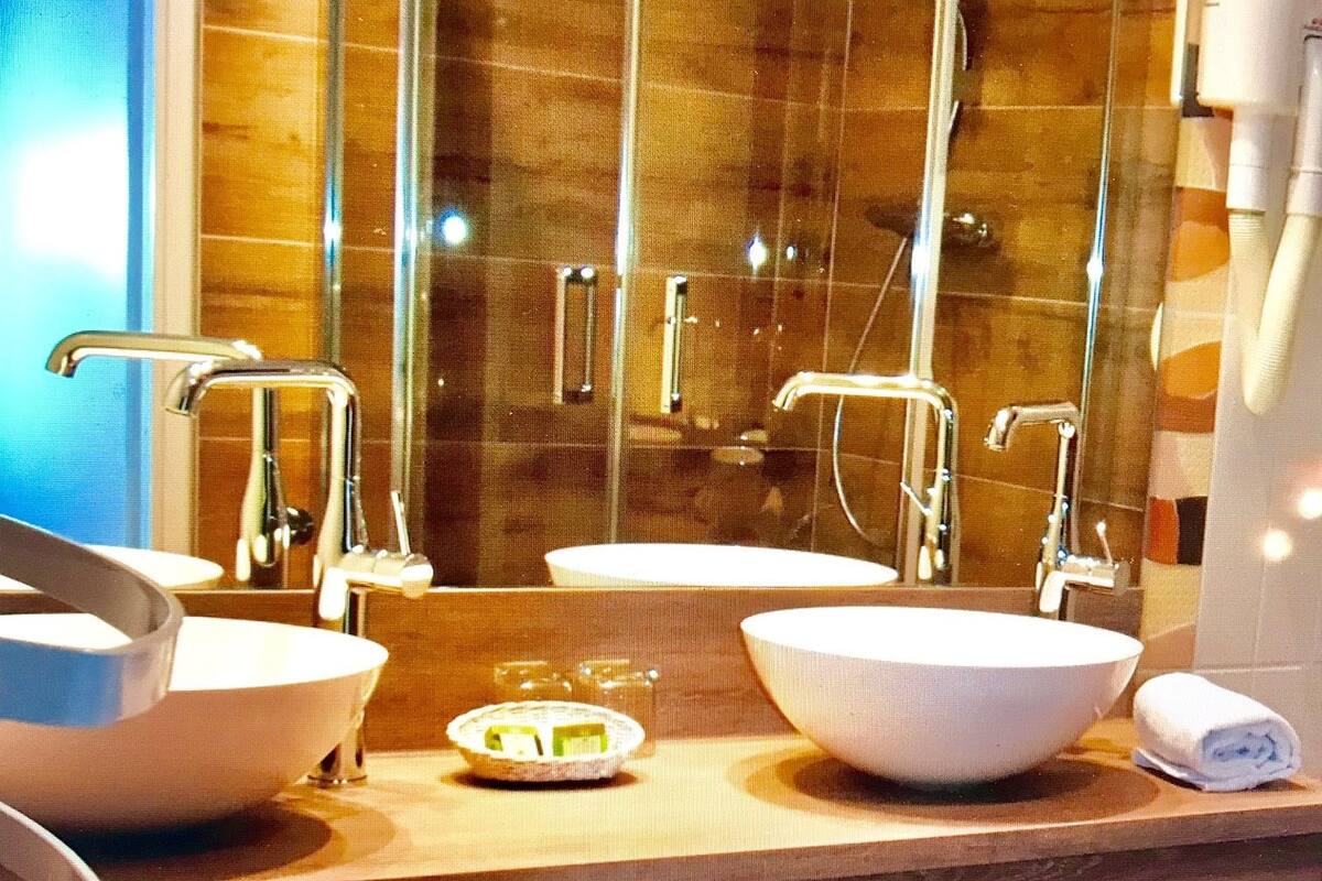 junior suite, jetted tub | bathroom | shower, bathrobes, towels