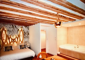 Junior Suite, Jetted Tub | Premium bedding, minibar, in-room safe, individually decorated