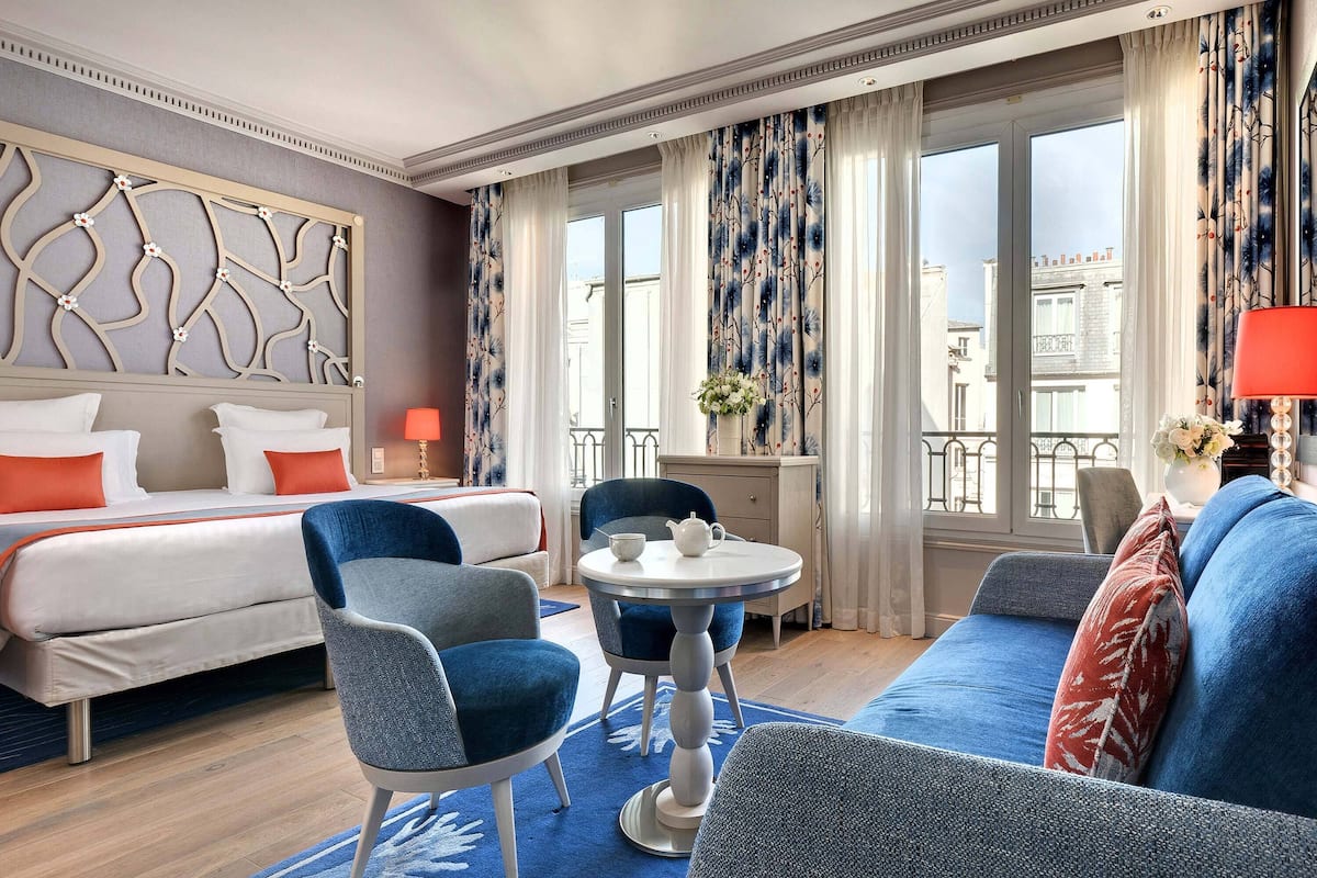 Deluxe Room | Premium bedding, in-room safe, desk, blackout drapes