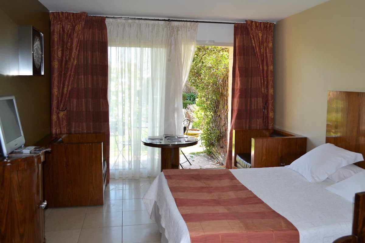 Desk, laptop workspace, cribs (free), rollaway beds (surcharge)