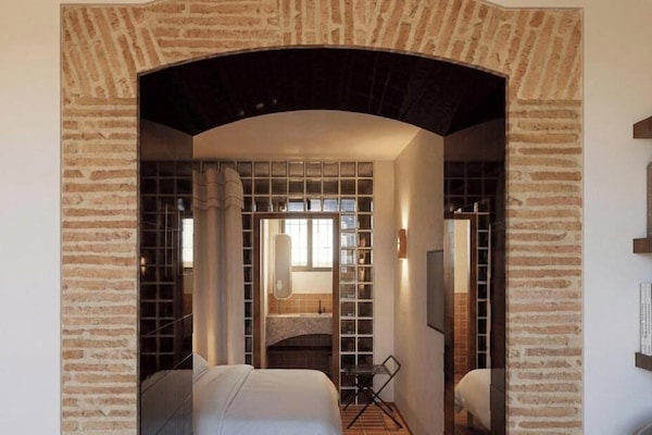 Deluxe Room with Terrace | Minibar, in-room safe, desk, soundproofing