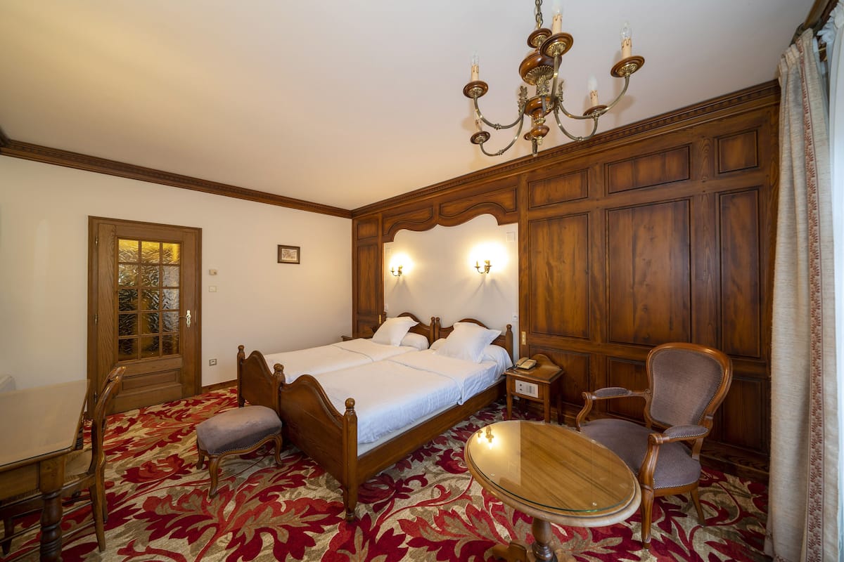 Deluxe Double Room, Balcony, Resort View | Minibar, individually decorated, desk, laptop workspace