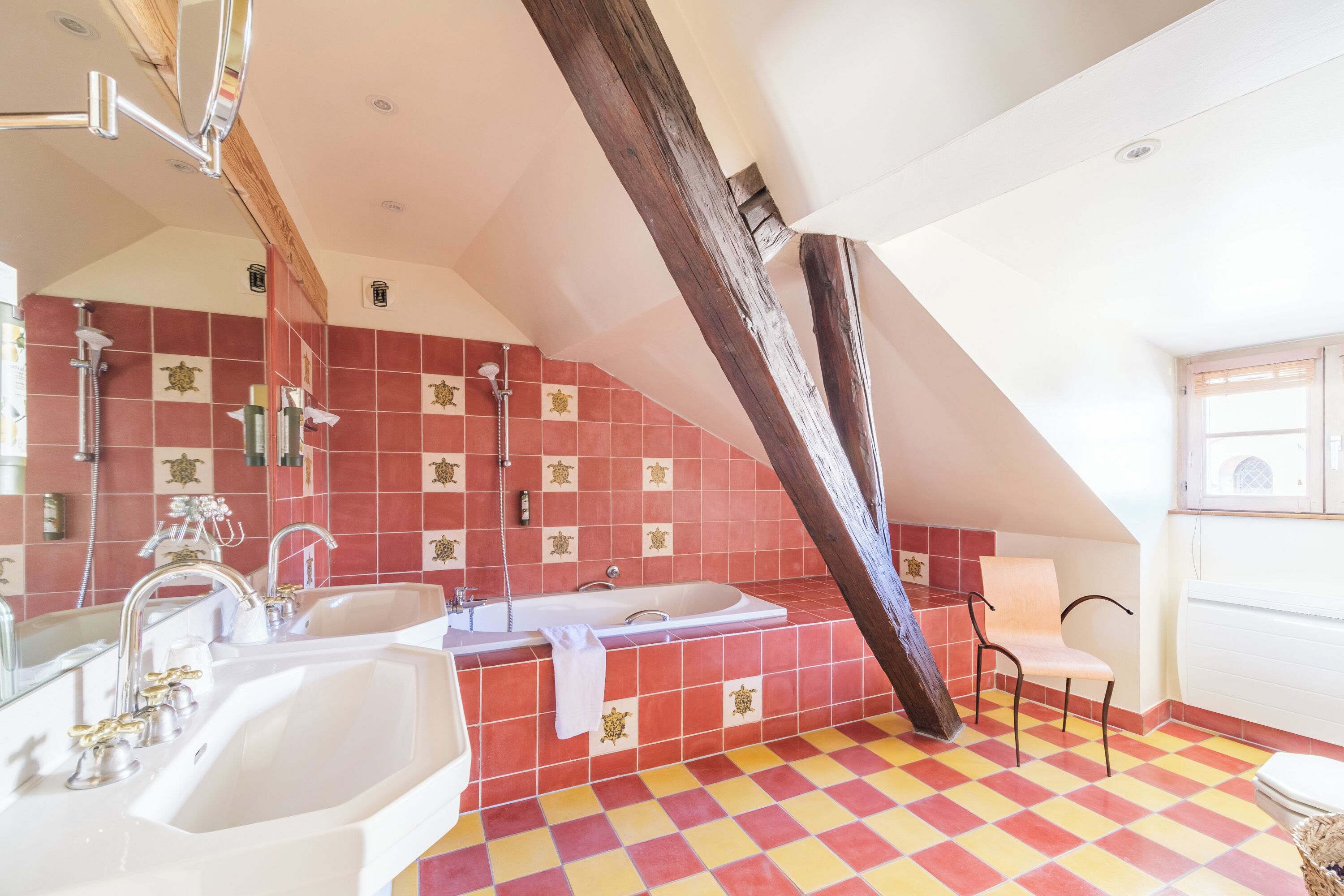 junior suite | bathroom | bathtub, free toiletries, hair dryer, towels