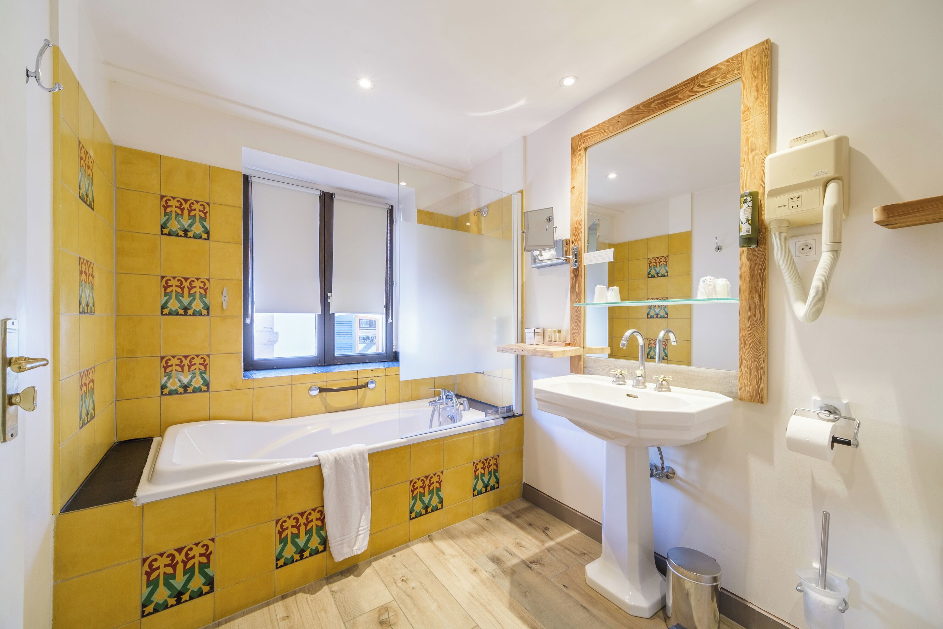 superior double room | bathroom | bathtub, free toiletries, hair dryer, towels