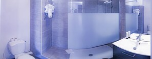 Shower, rainfall showerhead, hair dryer, towels
