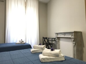 Triple Room, Private Bathroom | Premium bedding, in-room safe, desk, blackout drapes - Hostal El Pilar (Madrid)