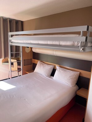 Standard Room, Multiple Beds (1 Double and 1 Single bed) | Individually furnished, desk, blackout drapes, soundproofing