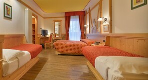 Deluxe Quadruple Room | Hypo-allergenic bedding, in-room safe, desk, soundproofing