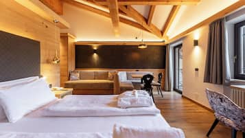 Suite junior | Sábanas italianas Frette, edredones de plumas, colchones Select Comfort