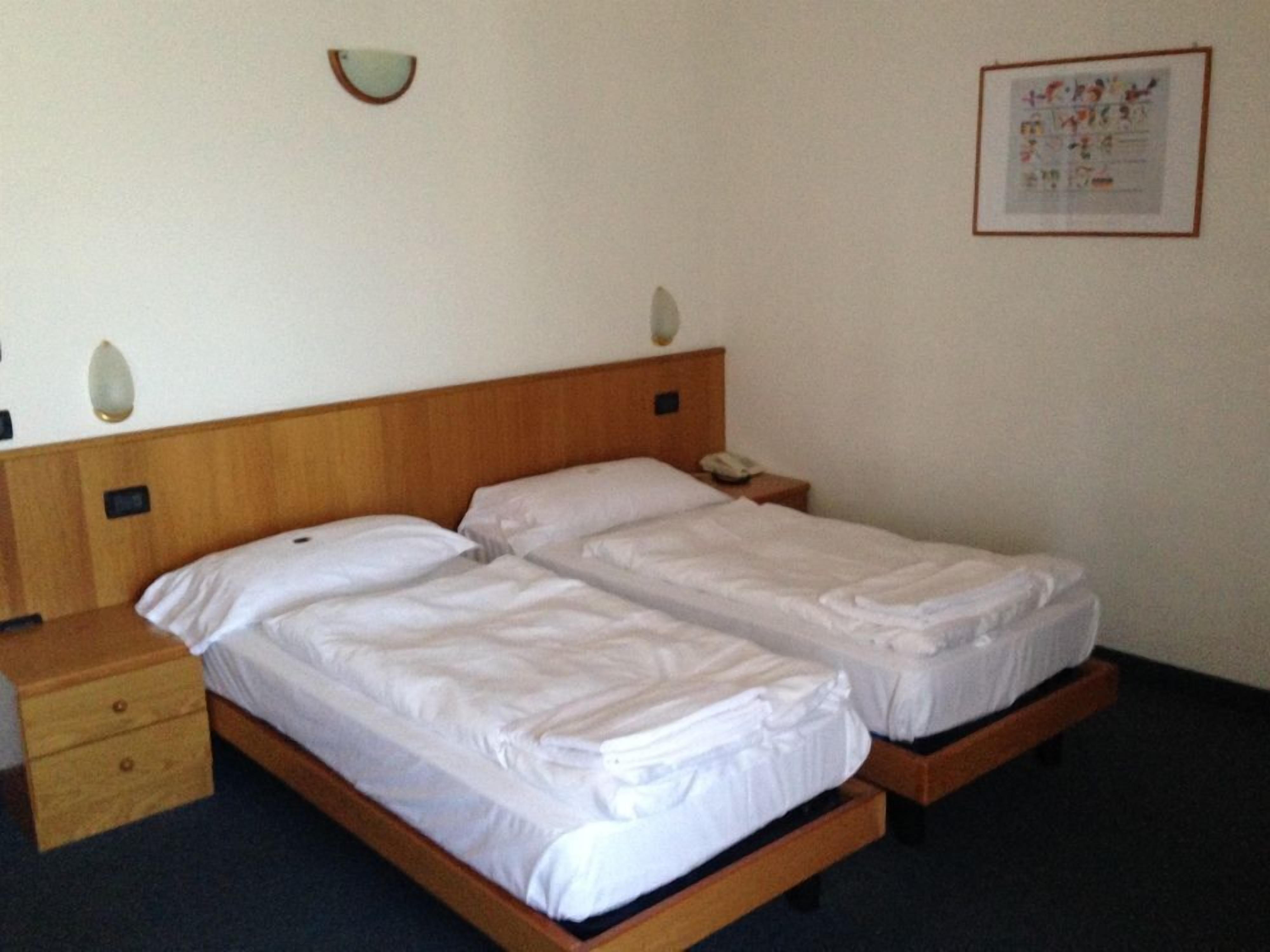 Down duvets, Select Comfort beds, in-room safe, desk