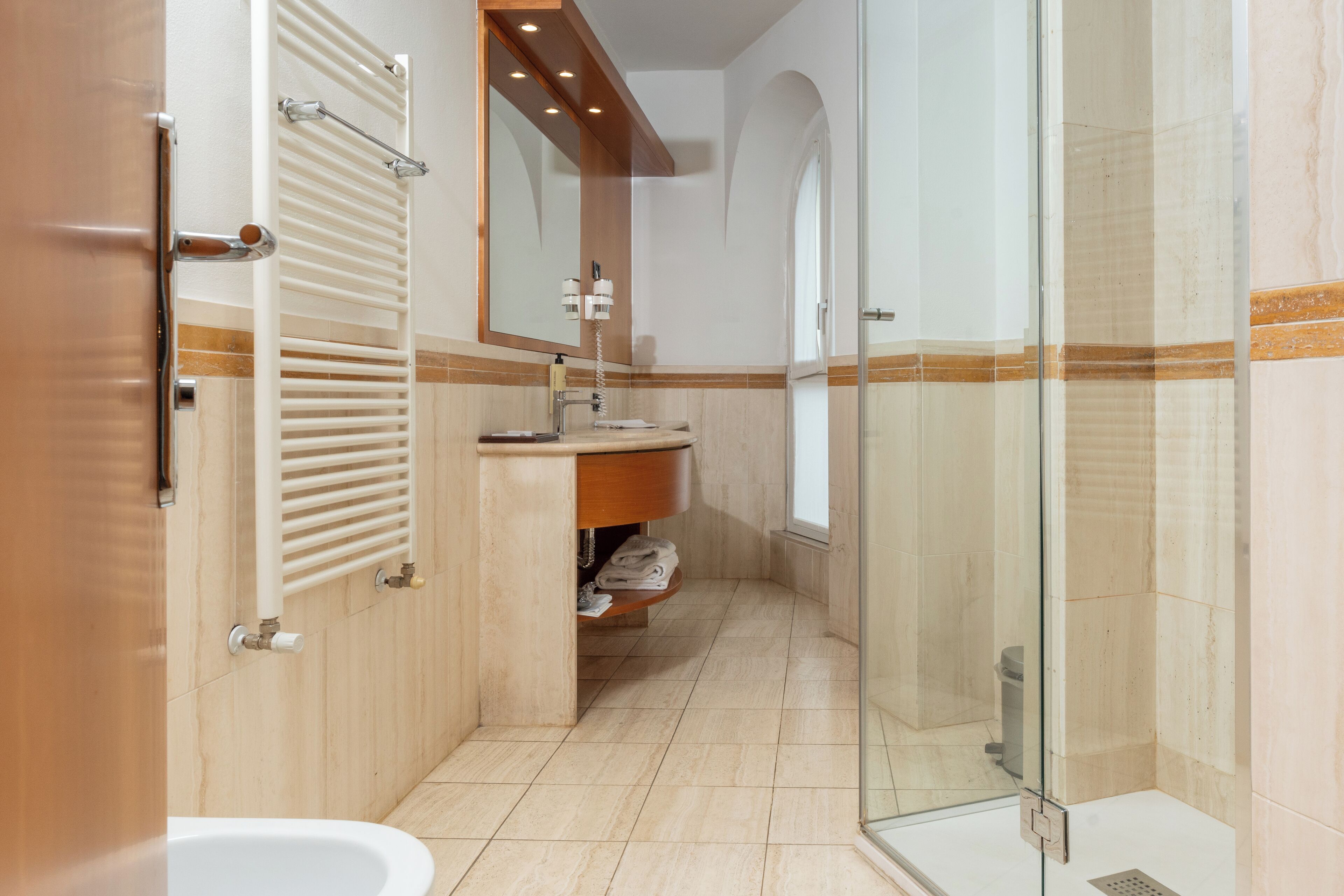 shower, hair dryer, slippers, bidet