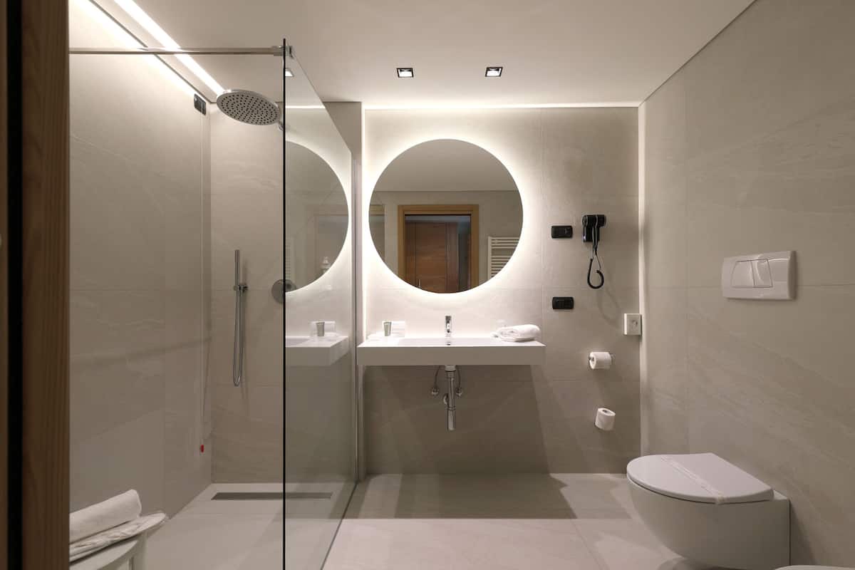 free toiletries, hair dryer, slippers, bidet