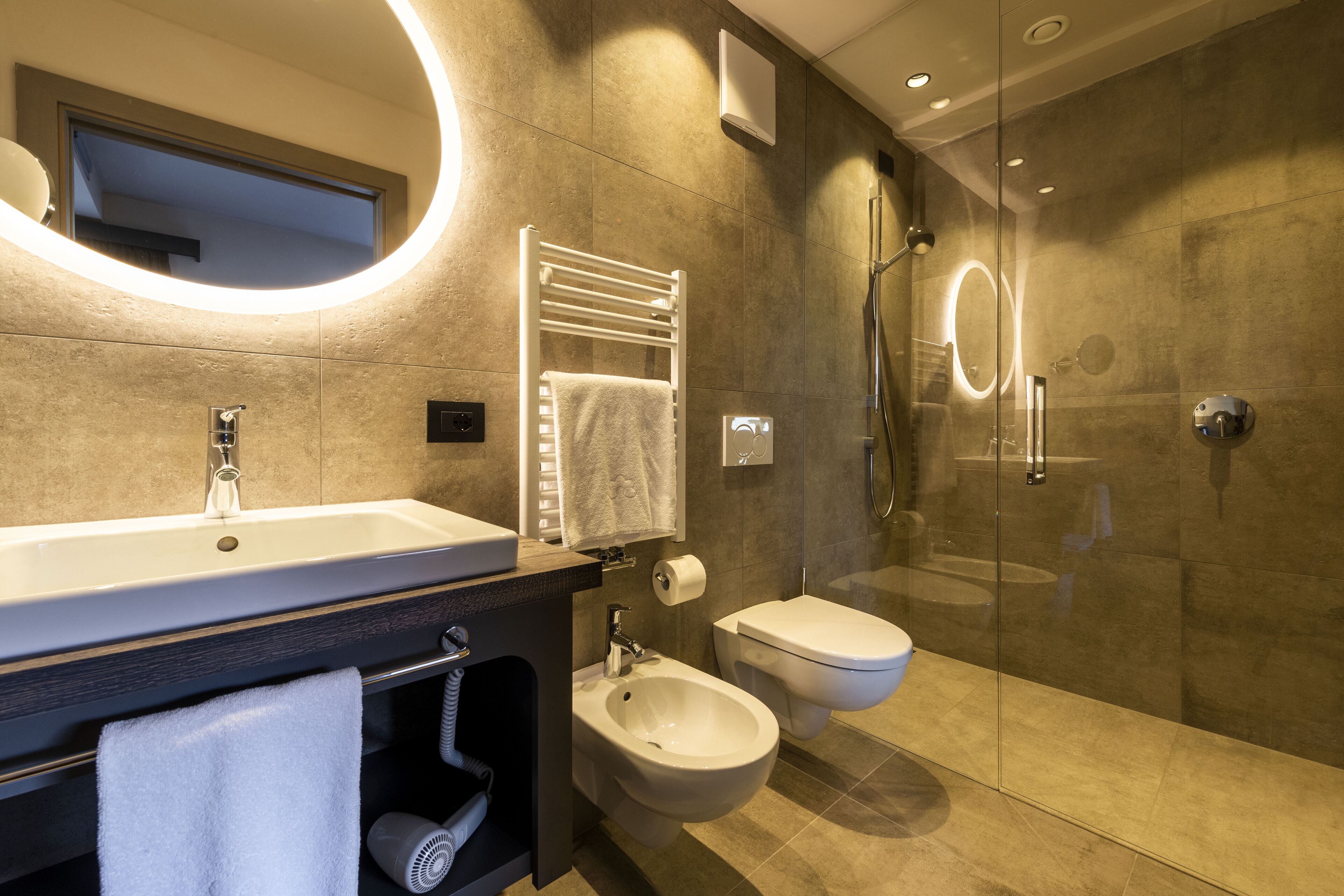 comfort single room | bathroom | hair dryer, towels, soap, shampoo