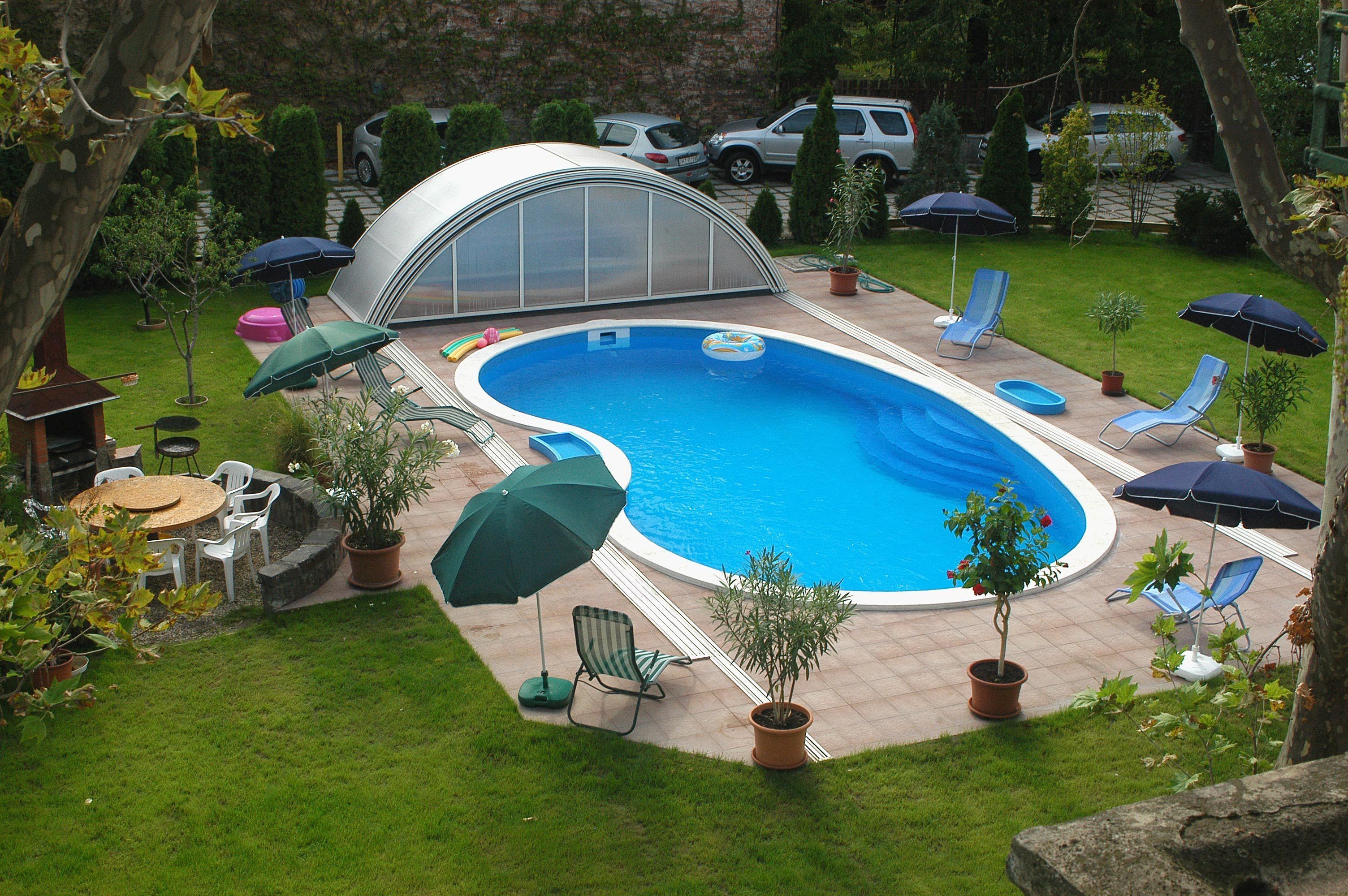 seasonal outdoor pool, open 8:00 am to 10:00 pm, pool umbrellas