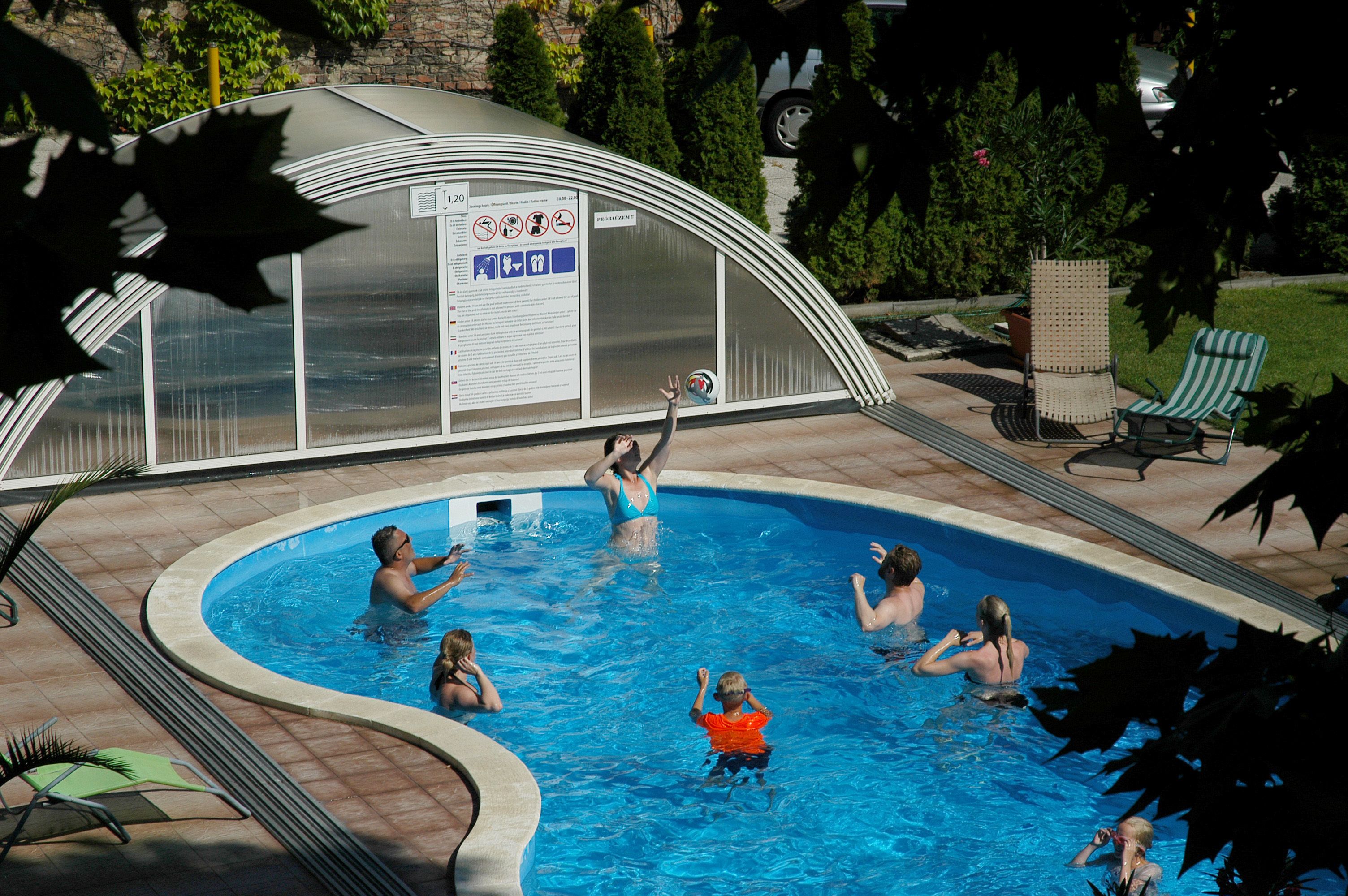 seasonal outdoor pool, open 8:00 am to 10:00 pm, pool umbrellas