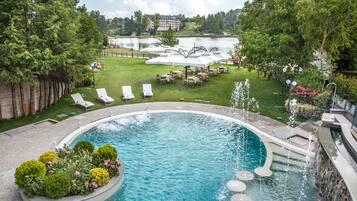 Indoor pool, outdoor pool, open 9:00 AM to 7:00 PM, pool loungers