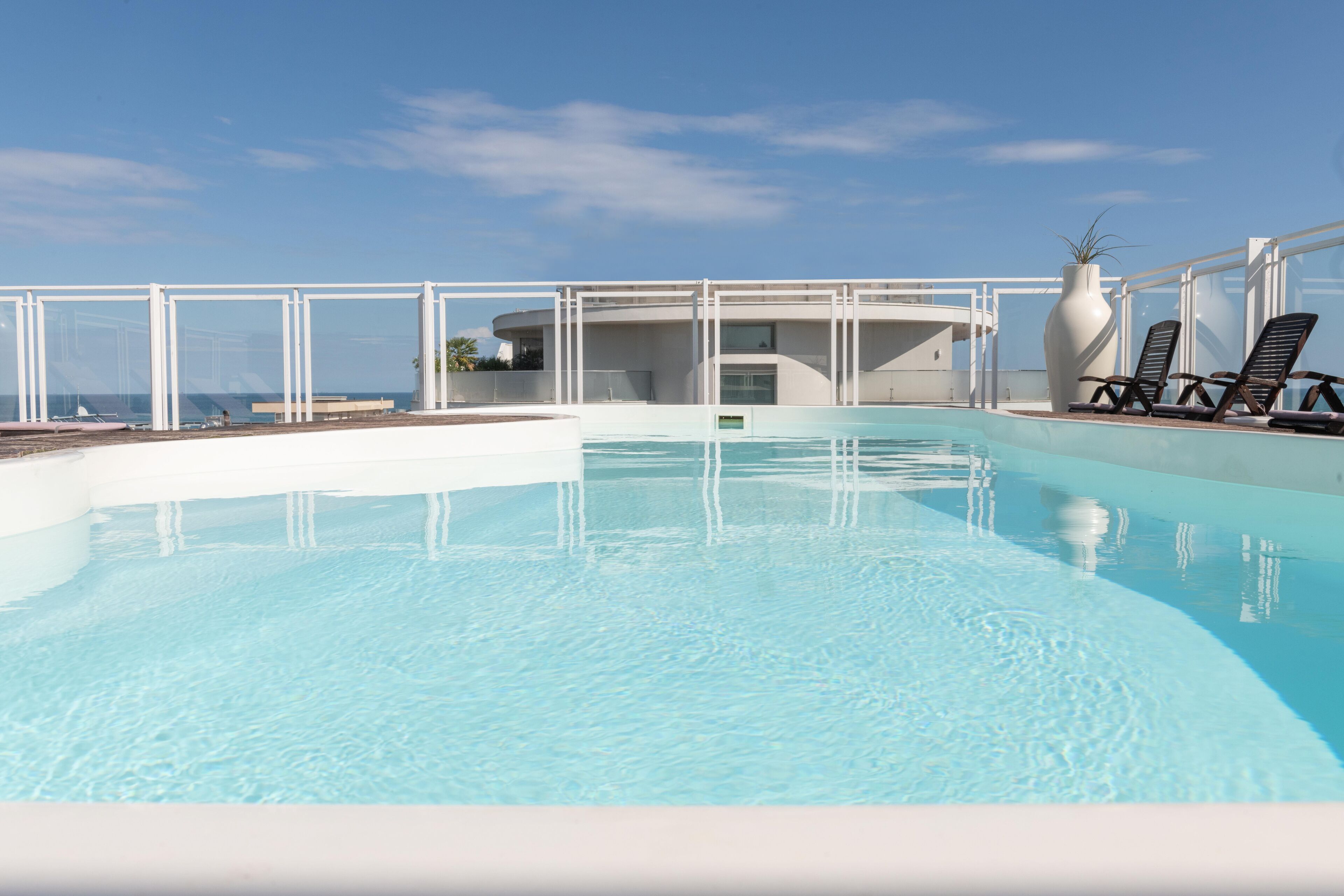 outdoor pool, pool loungers