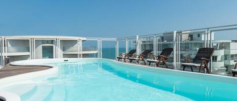 Outdoor pool, sun loungers