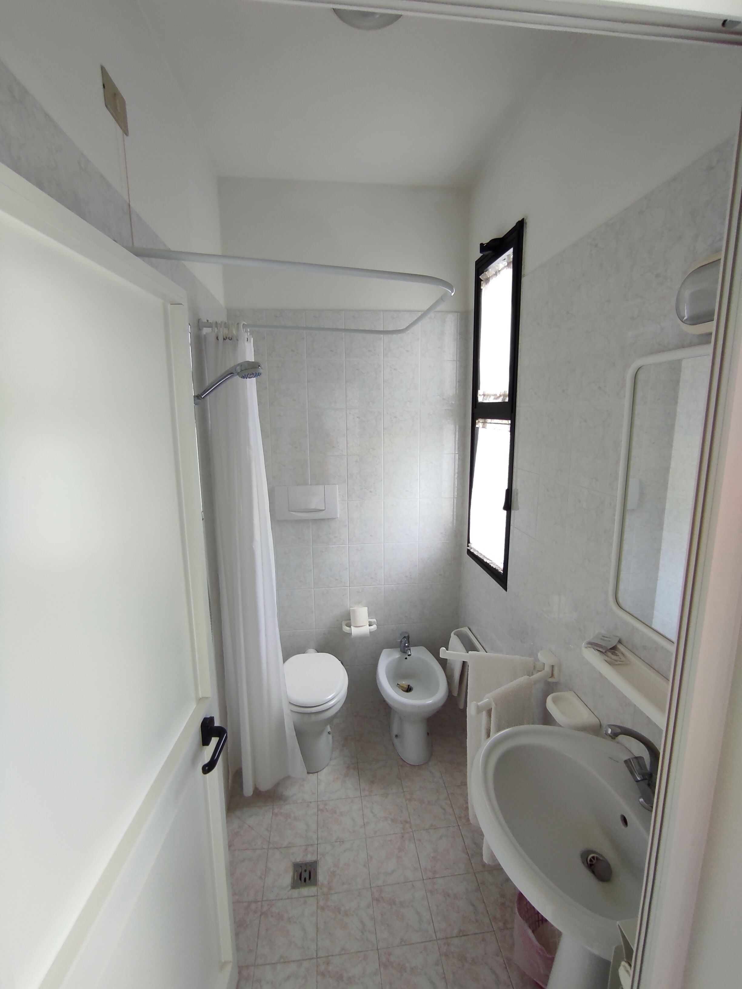 economy single room | bathroom | shower, free toiletries, hair dryer, dressing gowns