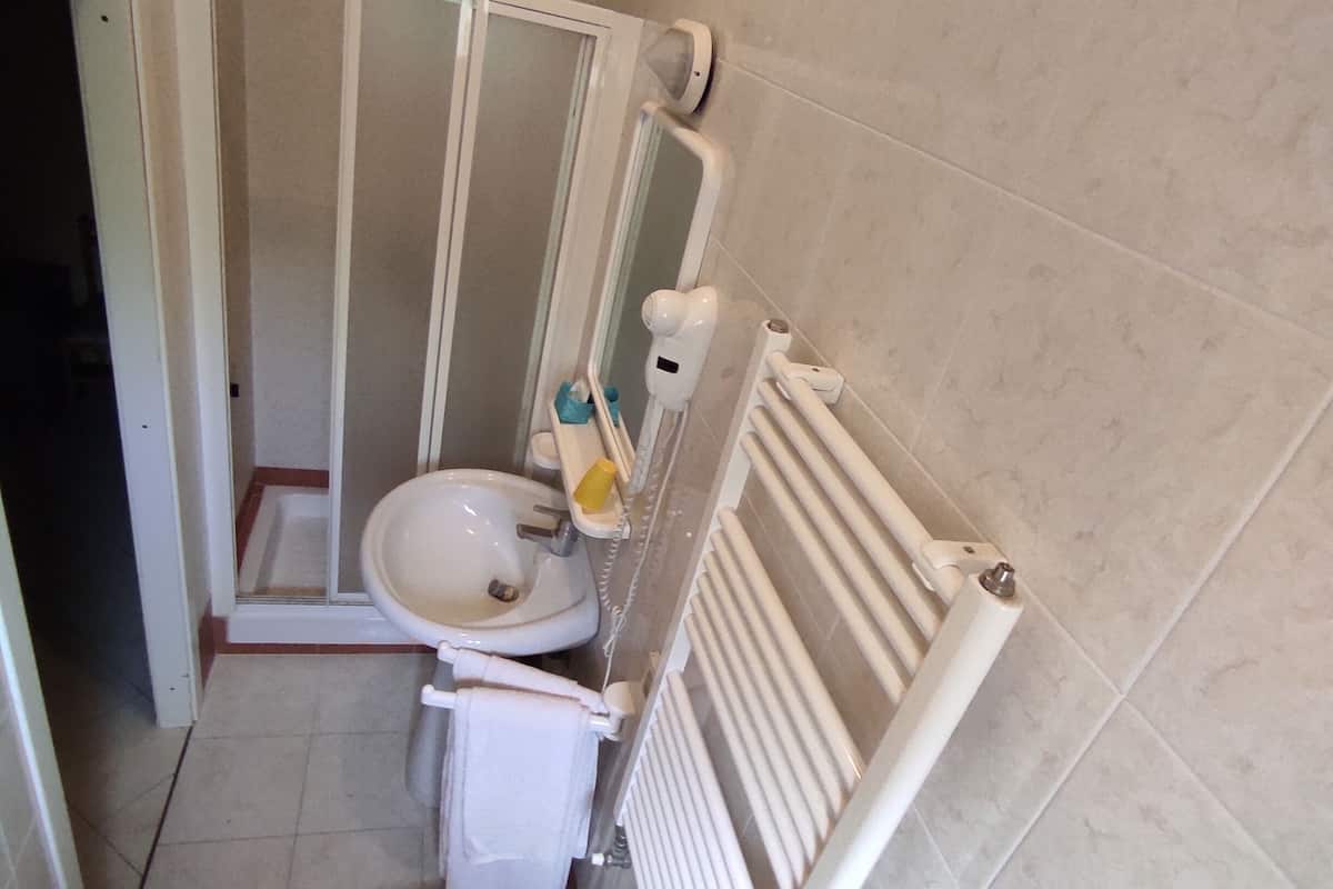 shower, free toiletries, hair dryer, dressing gowns