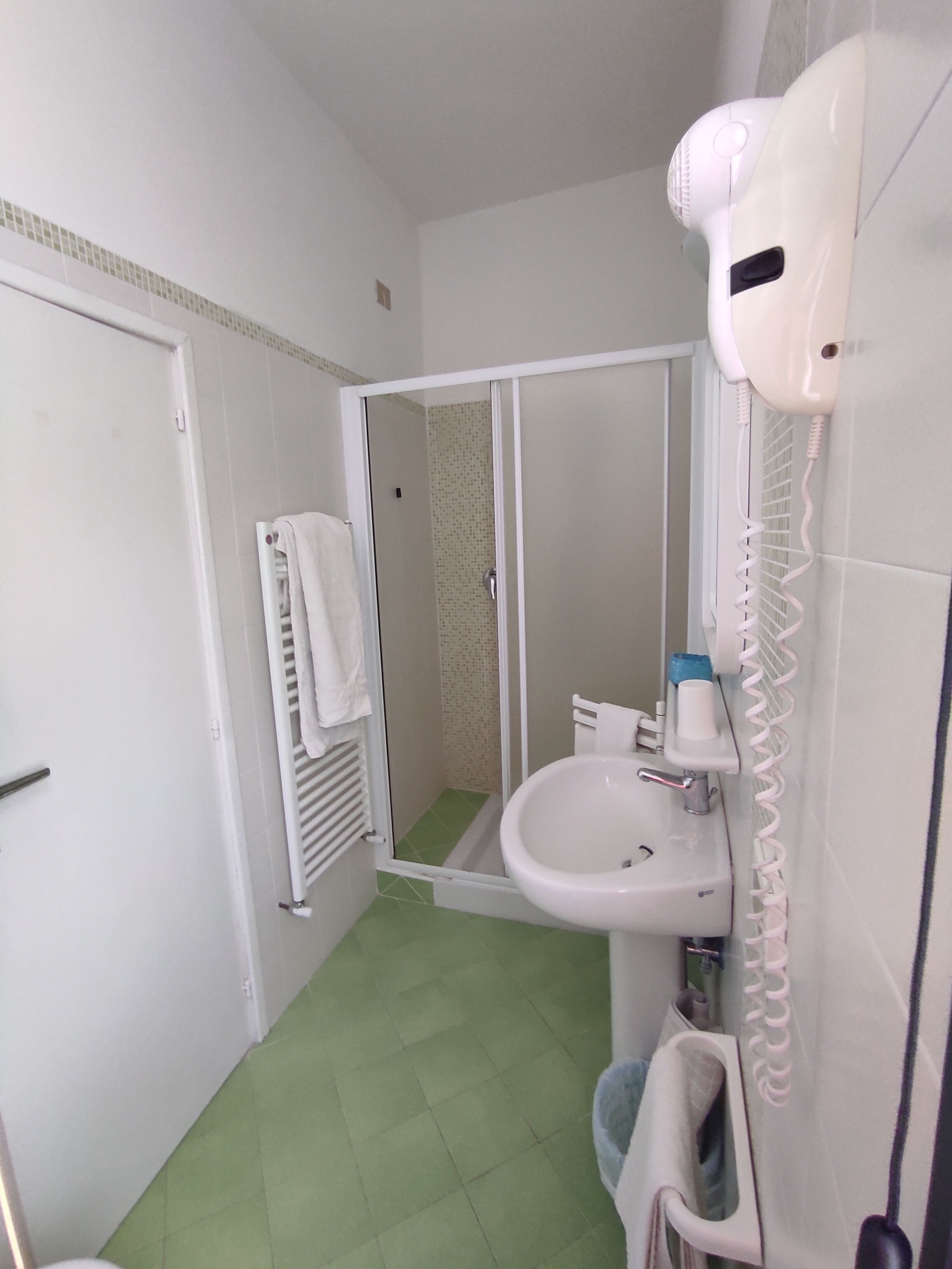 economy double room | bathroom | shower, free toiletries, hair dryer, dressing gowns