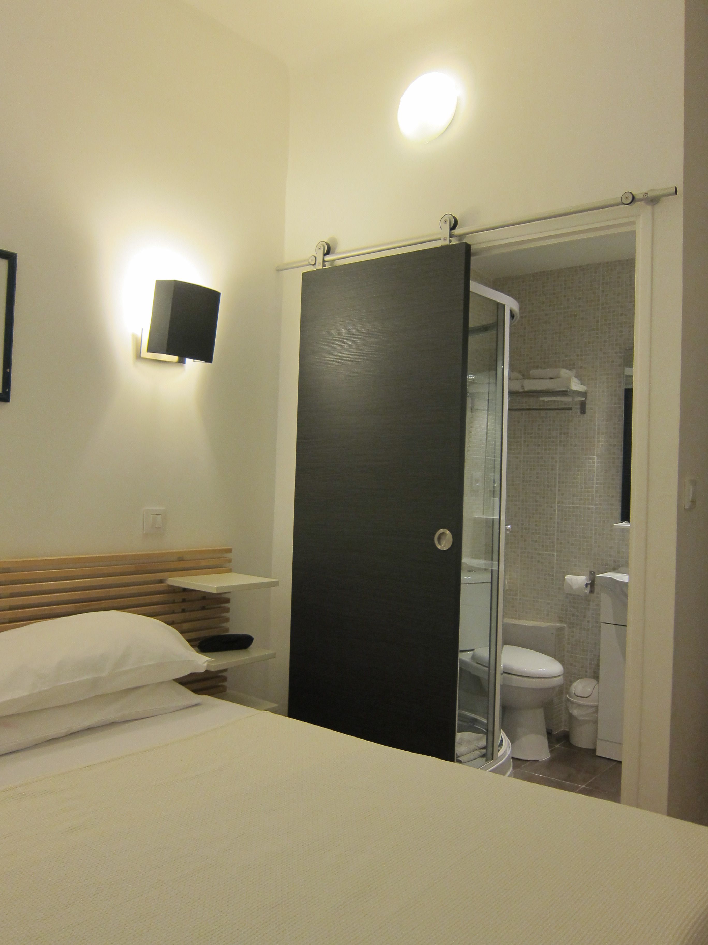 Twin Room | Minibar, in-room safe, individually decorated, individually furnished