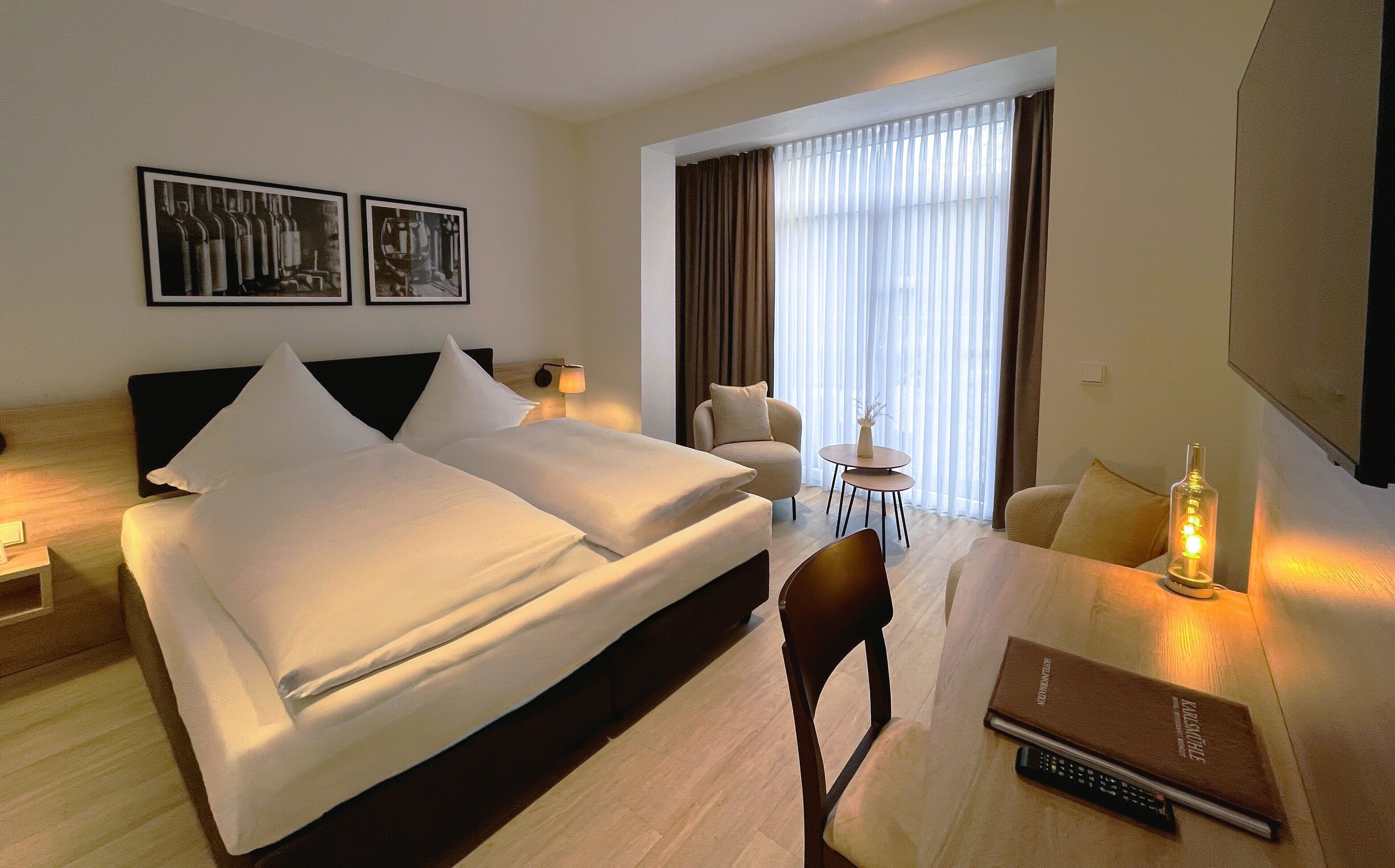 Executive tweepersoonskamer | Een bureau, een strijkplank/strijkijzer, gratis wifi, beddengoed