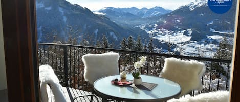 Deluxe Apartment, 3 Bedrooms, Terrace, Mountain View | Living area | 39-inch flat-screen TV with satellite channels, toys