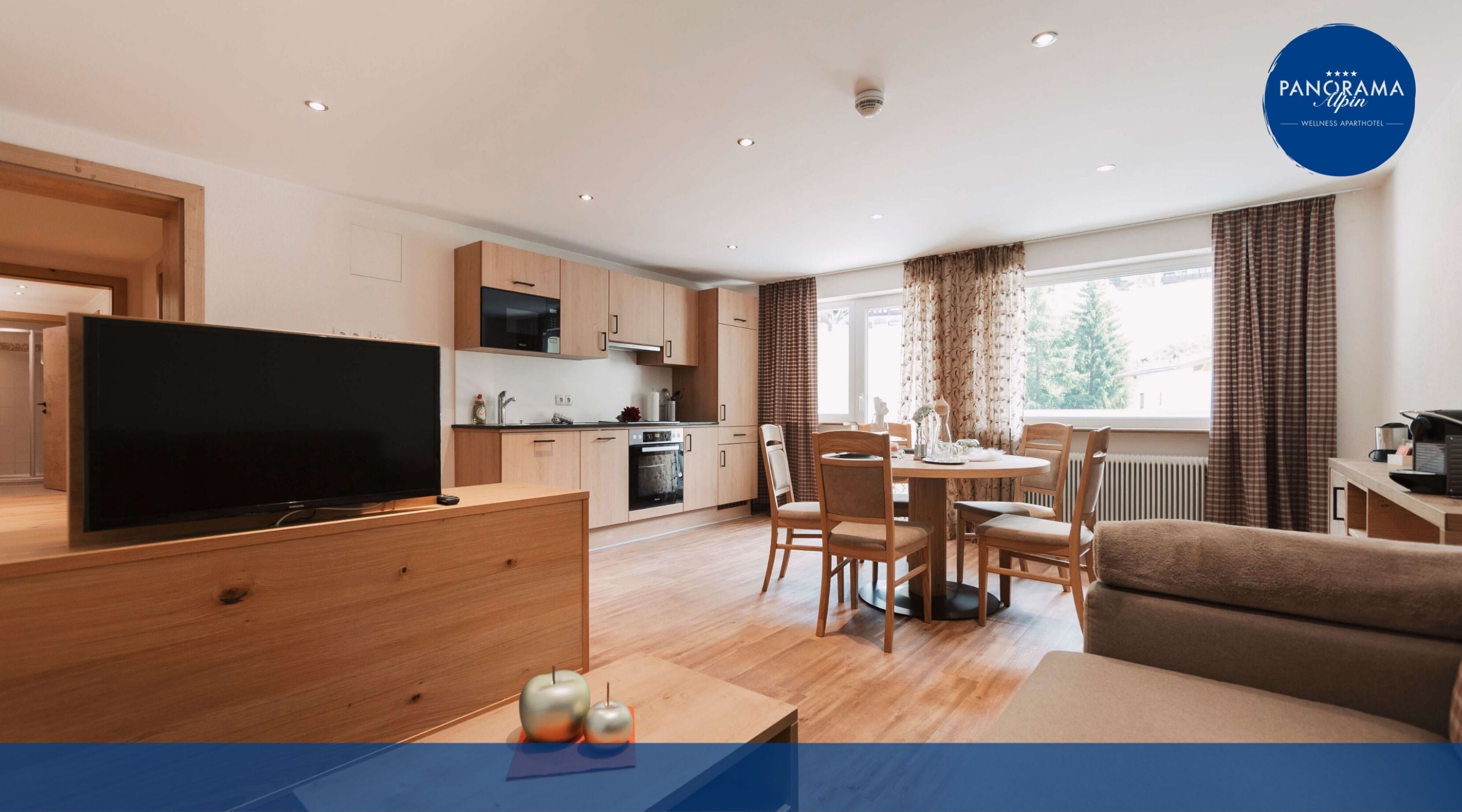 Family Apartment, 2 Bedrooms, Balcony, Mountainside | Living area | 39-inch flat-screen TV with satellite channels, toys