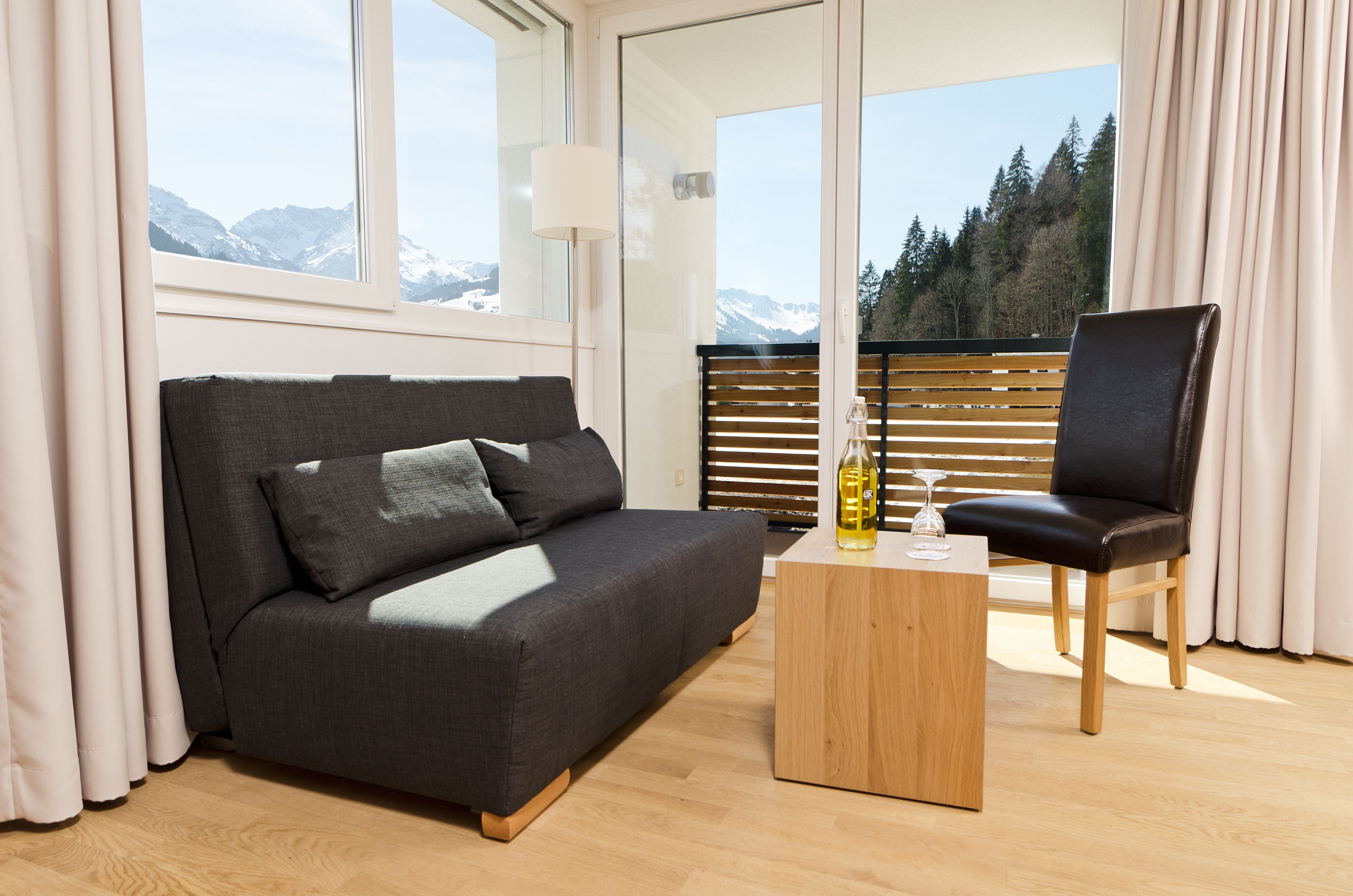 comfort double room, balcony or terrace (sonnahölderle) | living area | flat-screen tv