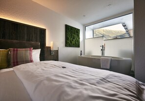 Suite, 2 Bedrooms, Sauna, Mountain View | Deep-soaking bathtub