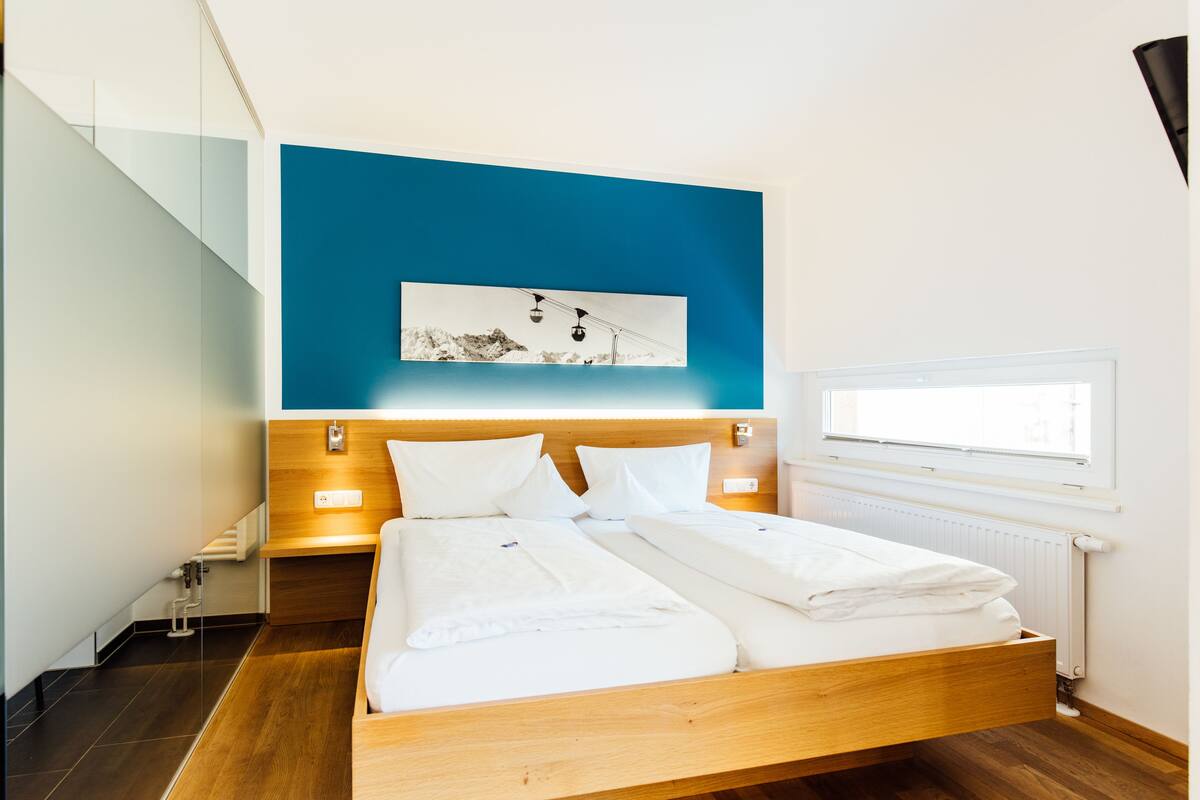 Double Room with balcony or Terrace (Moonetblüamle) | Ropa de cama de alta calidad, caja fuerte, cortinas opacas