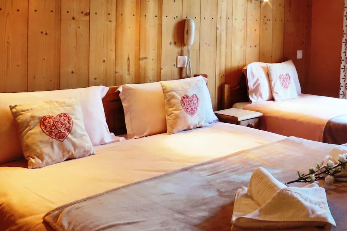 panoramic triple room, mountain view | in-room safe, desk, soundproofing, free wifi