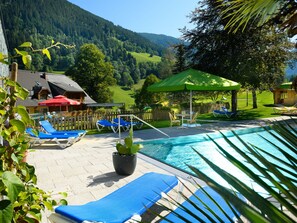 Outdoor pool, pool umbrellas, pool loungers