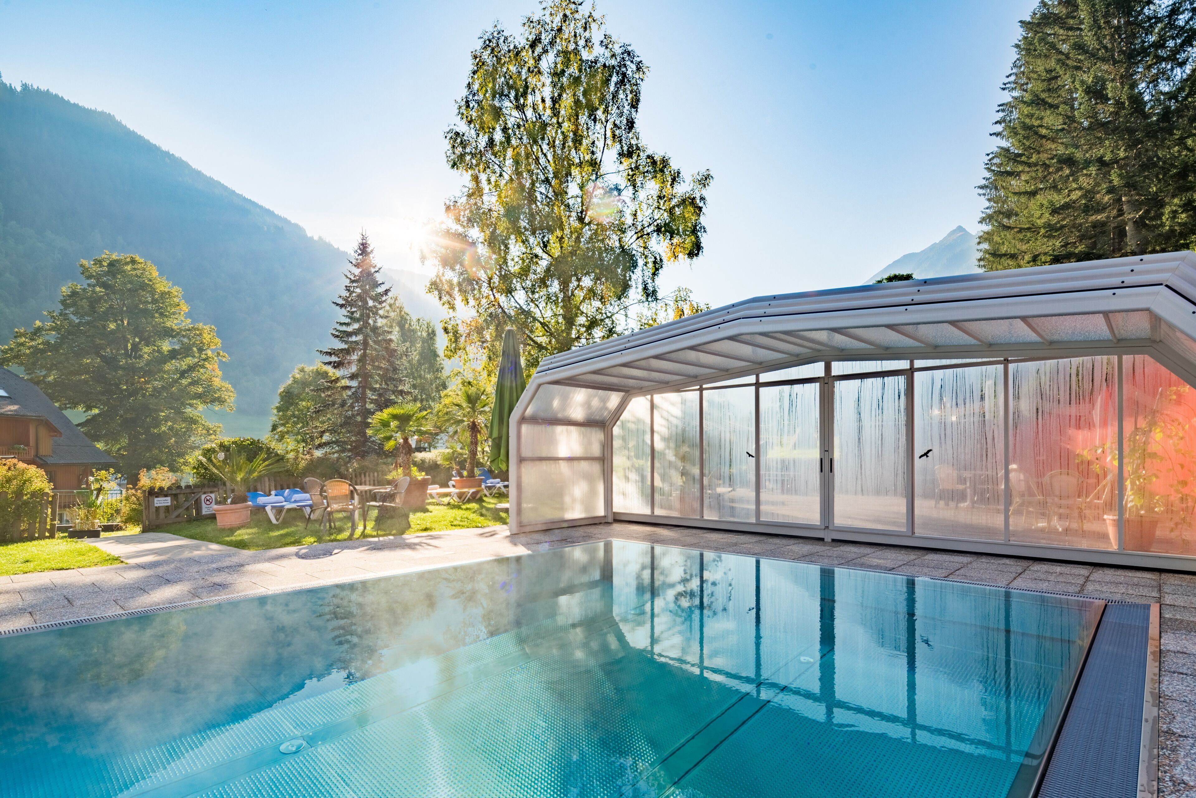 Outdoor pool, pool umbrellas, sun loungers
