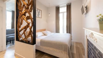 Family Room, Balcony, City View | 1 bedroom, premium bedding, individually decorated