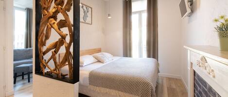 Family Room, Balcony, City View | Premium bedding, individually decorated, individually furnished, desk