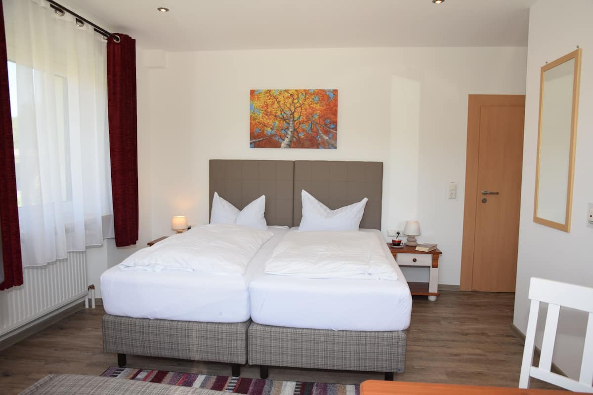 Desk, blackout curtains, free WiFi, bed sheets