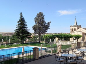 Outdoor pool, open 11:30 AM to 8:30 PM, pool umbrellas, pool loungers
