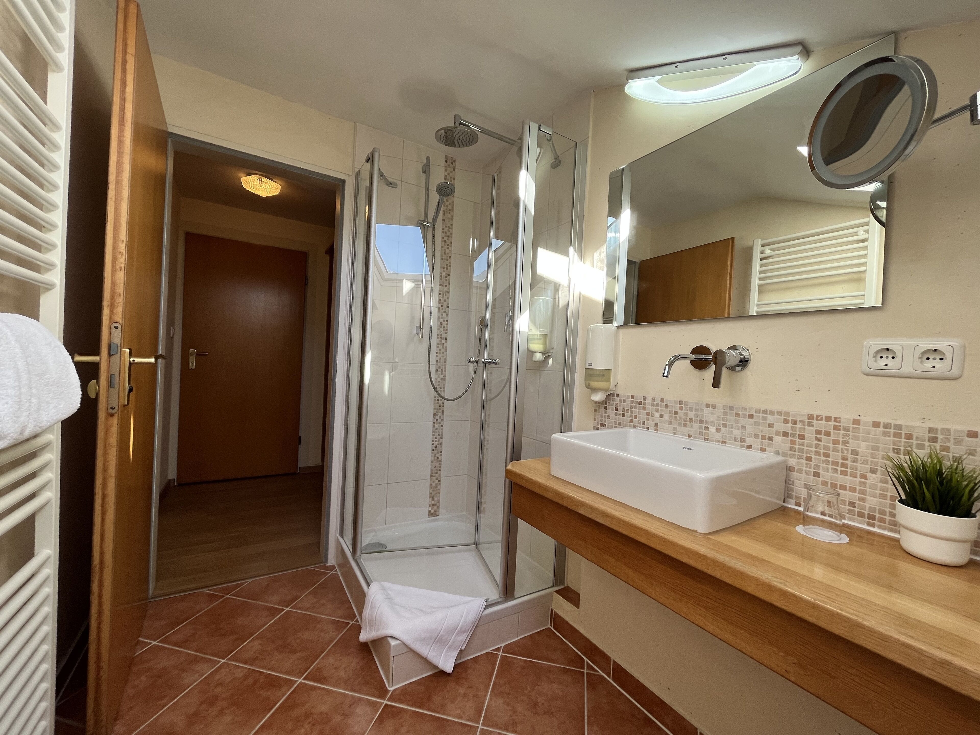 comfort single room | bathroom | rainfall showerhead, hair dryer, towels
