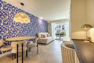 Apartment, 1 Bedroom, Balcony | Living area | Flat-screen TV