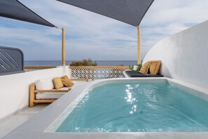 Deluxe Room, Sea View (Outdoor Jetted Tub) | Pool | Indoor pool, seasonal outdoor pool, pool umbrellas, pool loungers - Afroditi Venus Beach Resort (Santorini)