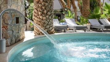 Indoor pool, seasonal outdoor pool, pool umbrellas, pool loungers