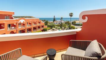 Suíte família, vista para o mar | Cofres nos quartos, escrivaninha, cortinas blackout