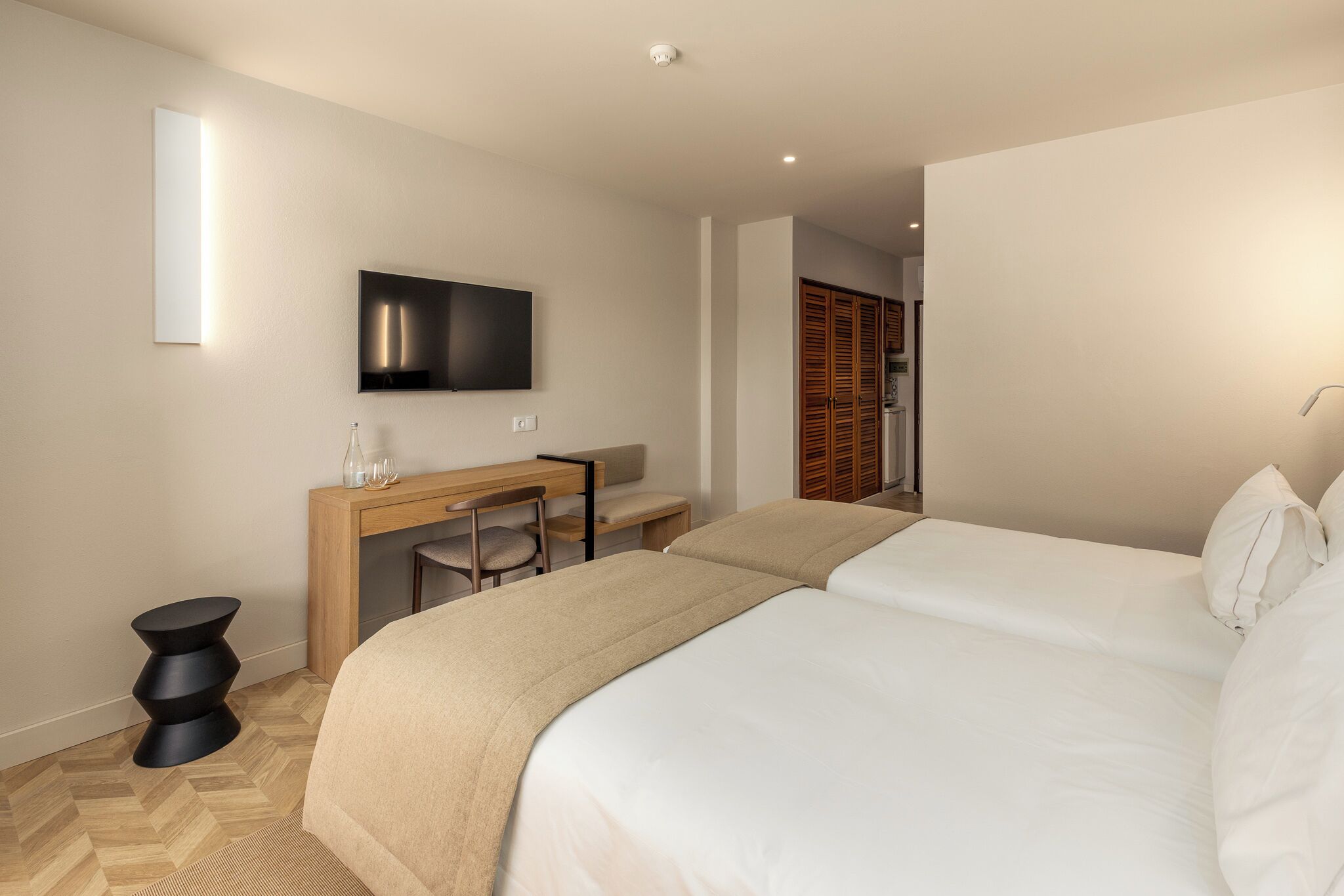 twin room, pool view | 1 bedroom, in-room safe, desk, blackout curtains